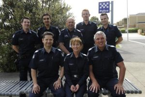 Cops tee up for charity
