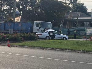 Woman injured in crash with truck