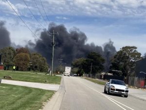 Smoke warning over paint plant fire