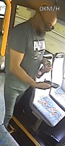 Bus passenger wanted over lewd act