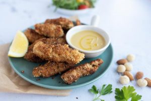 Cooking … Coconut and macadamia crusted chicken with honey mustard dressing