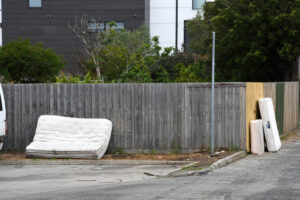 Businesses dumped with clean-up tab